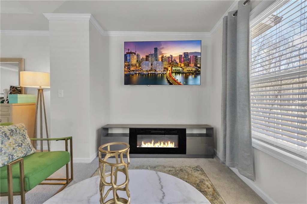 244 Wild Rose Circle Canton, GA 30115 - Photo 36 of 55 a view of a livingroom with furniture and a fireplace