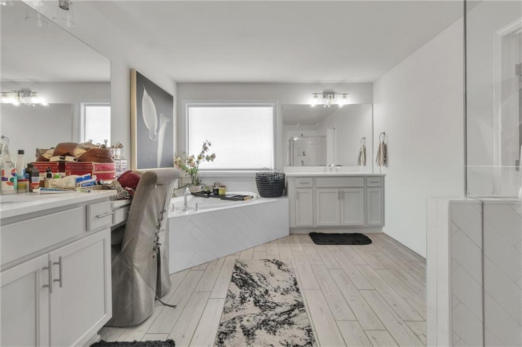 244 Wild Rose Circle Canton, GA 30115 - Photo 37 of 55 a kitchen with a sink cabinets and window