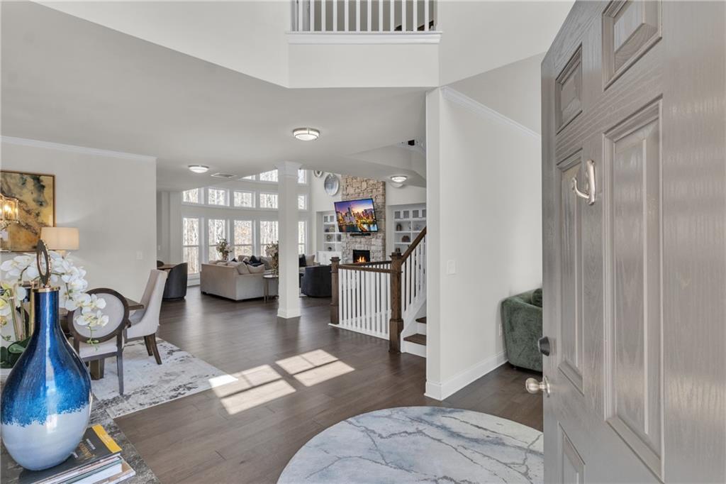 244 Wild Rose Circle Canton, GA 30115 - Photo 4 of 55 a living room with furniture and a table