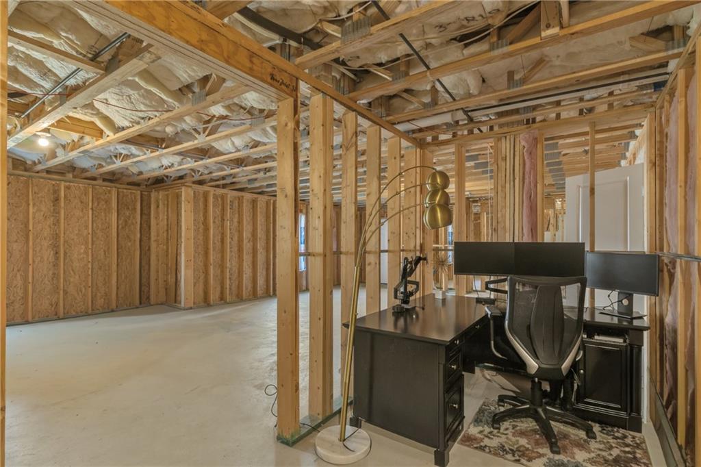 244 Wild Rose Circle Canton, GA 30115 - Photo 43 of 55 a view of a room with gym equipment