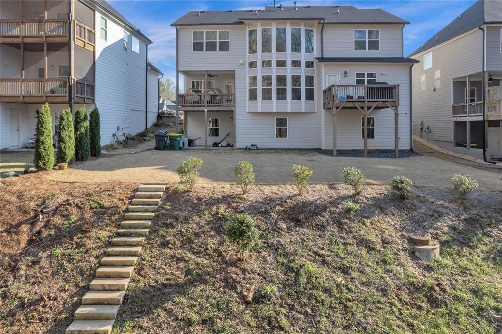244 Wild Rose Circle Canton, GA 30115 - Photo 45 of 55 a view of a house with a yard