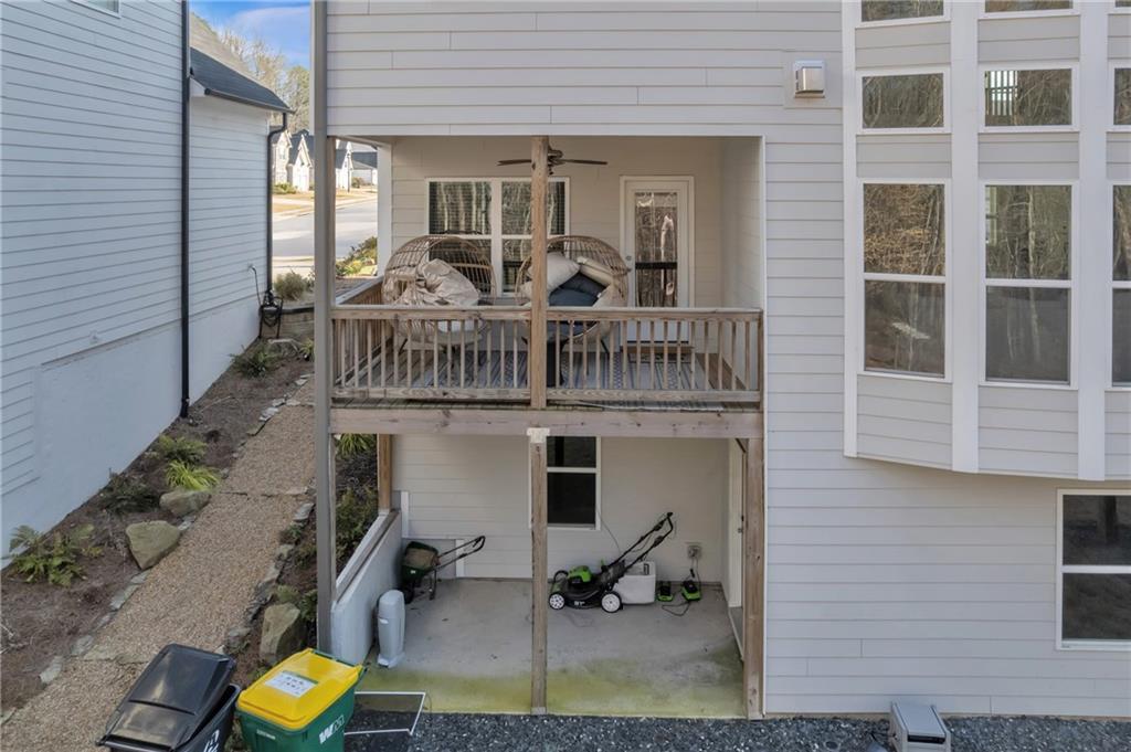 244 Wild Rose Circle Canton, GA 30115 - Photo 46 of 55 a view of balcony with two chairs and wooden floor