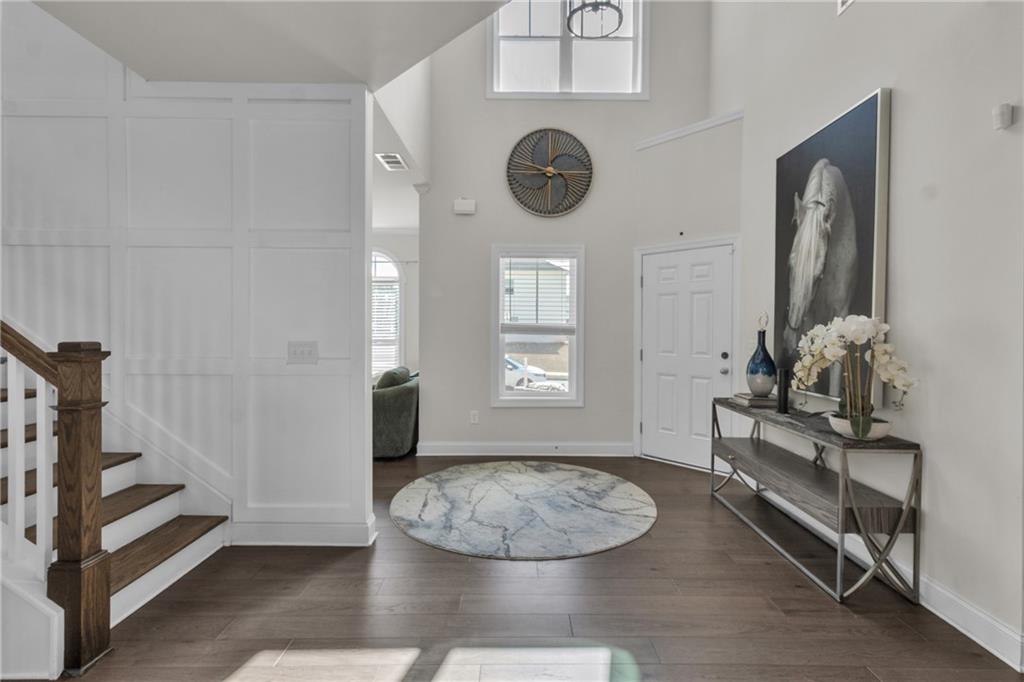 244 Wild Rose Circle Canton, GA 30115 - Photo 8 of 55 a view of a livingroom with furniture and hardwood floor