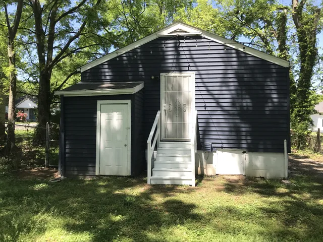 a front view of a house with garage