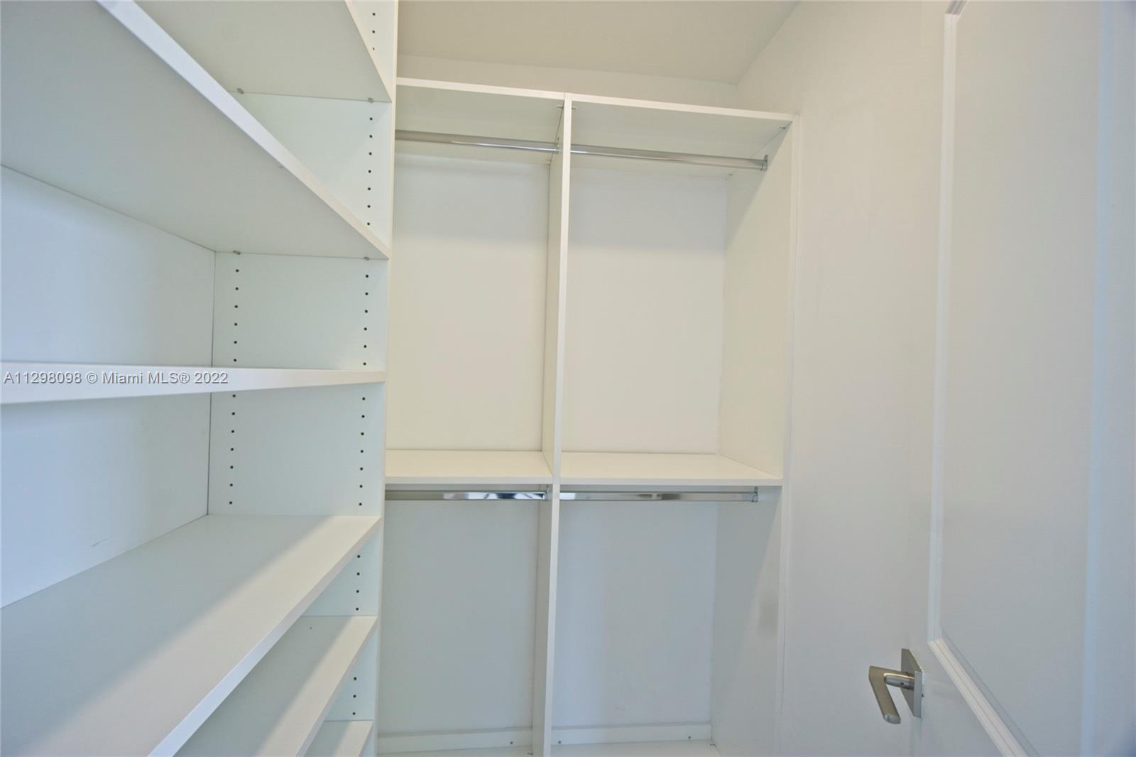 434 Southwest 23rd Road Miami, FL 33129 - Photo 16 of 32 a view of an empty walk in closet