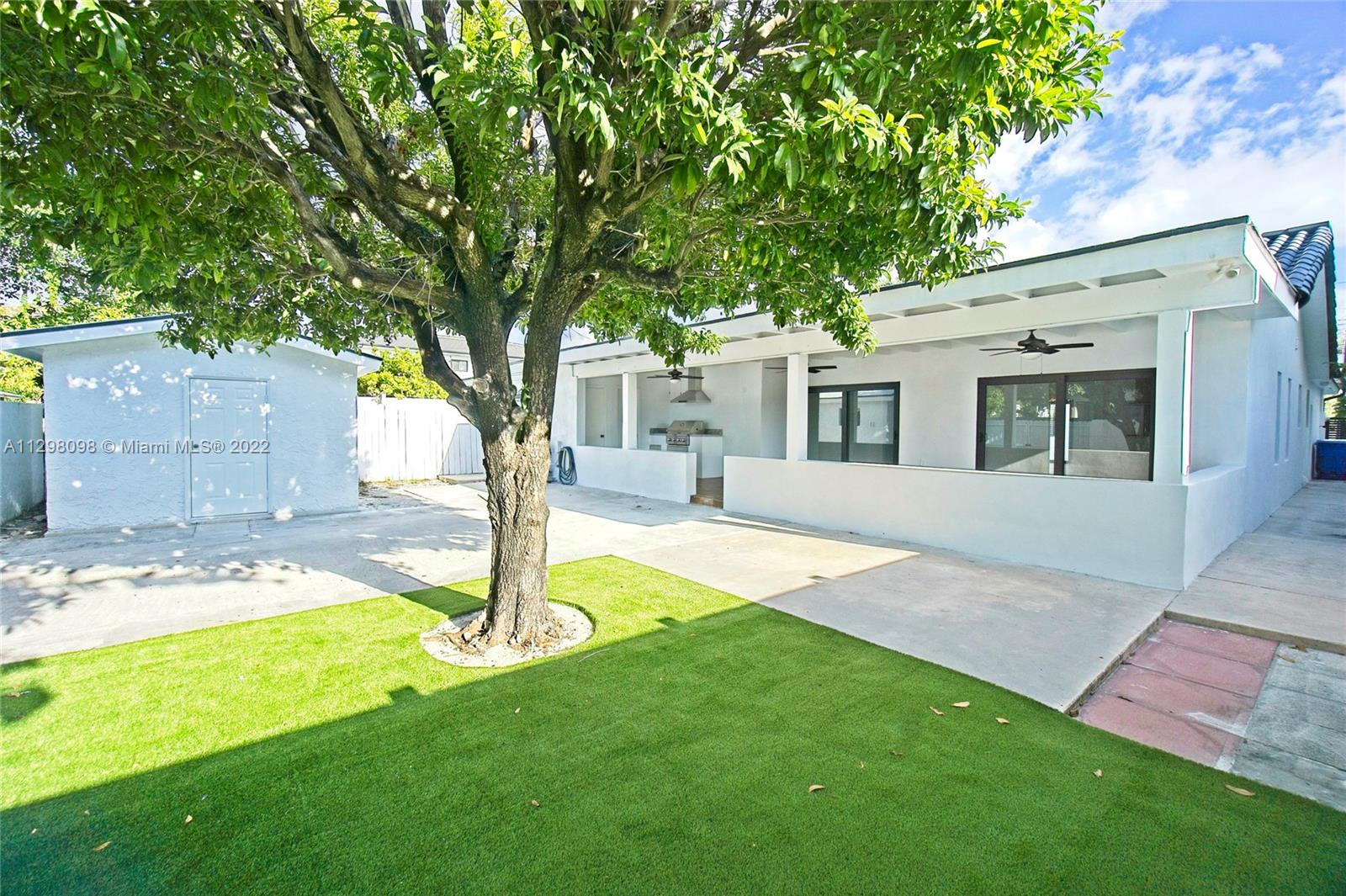 434 Southwest 23rd Road Miami, FL 33129 - Photo 26 of 32 a front view of a house with garden