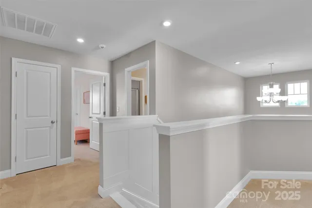 a view of livingroom with hardwood floor and a window