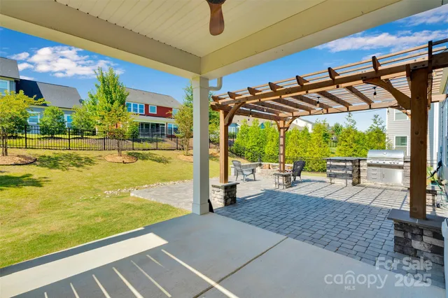 a view of a swimming pool with a patio