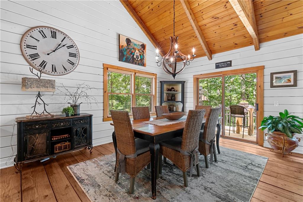 223 Denny Ridge Road Jasper, GA 30143 - Photo 12 of 54 a view of a dining room with furniture window and wooden floor