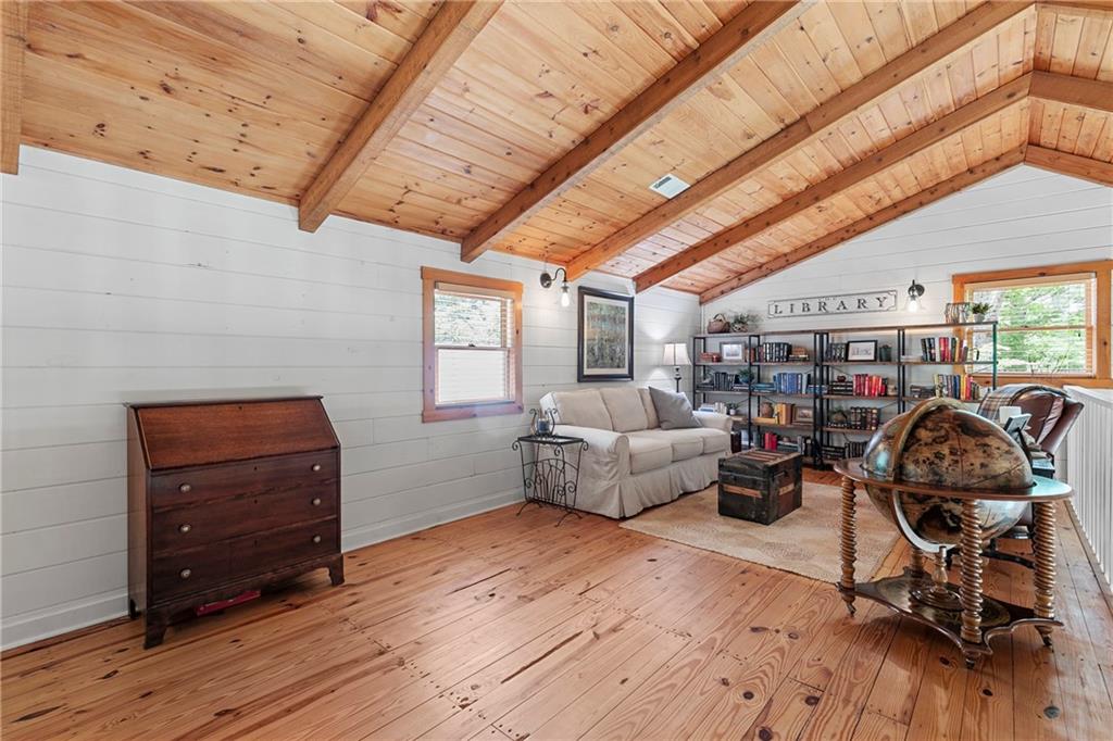 223 Denny Ridge Road Jasper, GA 30143 - Photo 19 of 54 a living room with furniture and wooden floor
