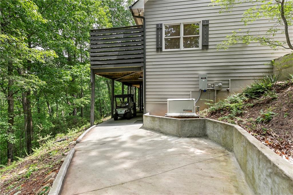 223 Denny Ridge Road Jasper, GA 30143 - Photo 29 of 54 a view of a house with a yard and sitting area