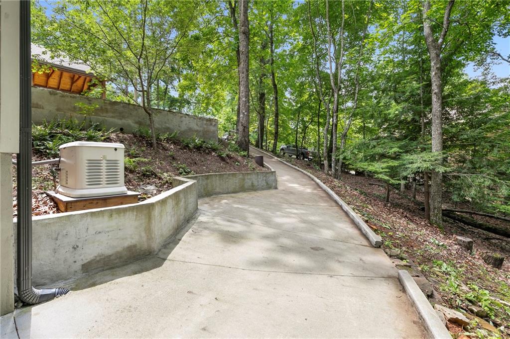 223 Denny Ridge Road Jasper, GA 30143 - Photo 31 of 54 a view of a backyard with sitting area