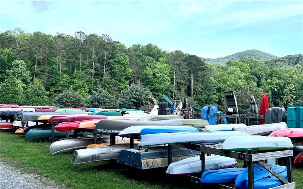 223 Denny Ridge Road Jasper, GA 30143 - Photo 41 of 54 a patio with table and chairs