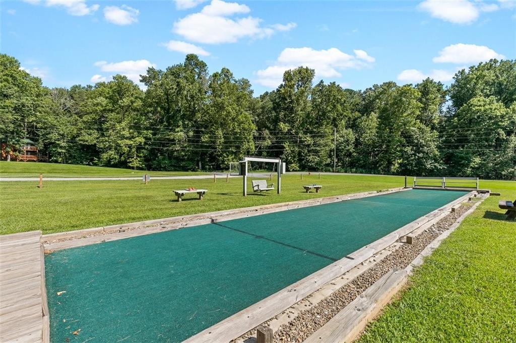 223 Denny Ridge Road Jasper, GA 30143 - Photo 42 of 54 a view of a green field with clear sky