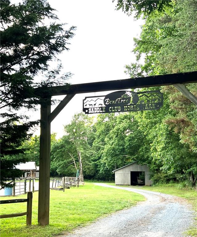 223 Denny Ridge Road Jasper, GA 30143 - Photo 51 of 54 a view of a swimming pool and trees in the background