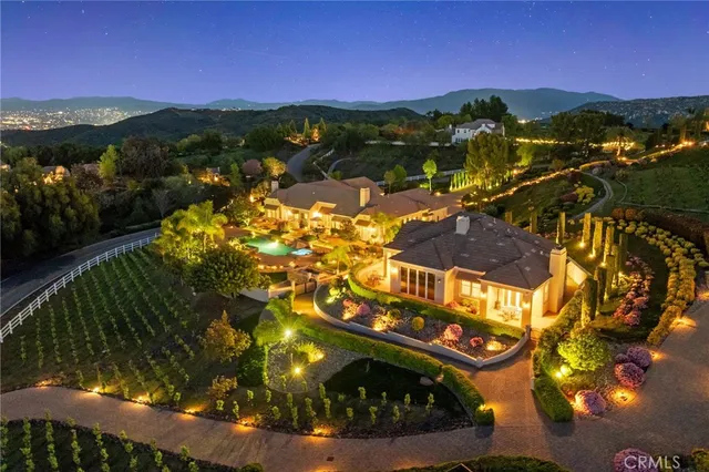 a view of a swimming pool with a yard