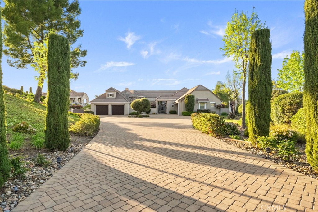 44195 Sunset Terrace Temecula, CA 92590 - Photo 23 of 74 a house view with a garden space