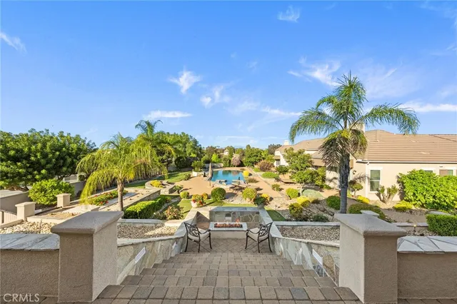 a kitchen with a stove a sink and a refrigerator
