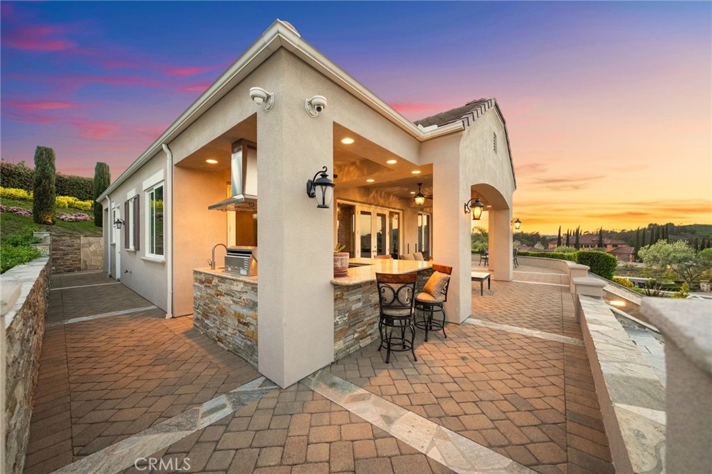 44195 Sunset Terrace Temecula, CA 92590 - Photo 43 of 74 a view of a patio with table and chairs