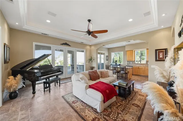 a view of a swimming pool with a table and chairs