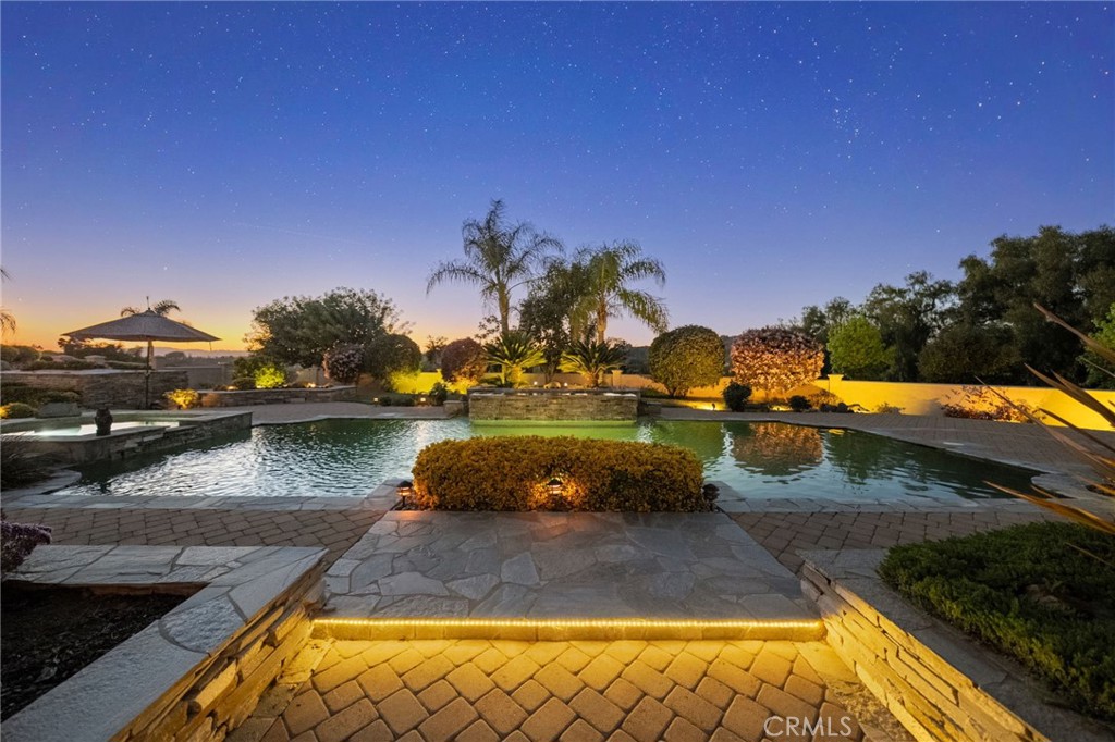 44195 Sunset Terrace Temecula, CA 92590 - Photo 8 of 74 a view of a swimming pool with a yard