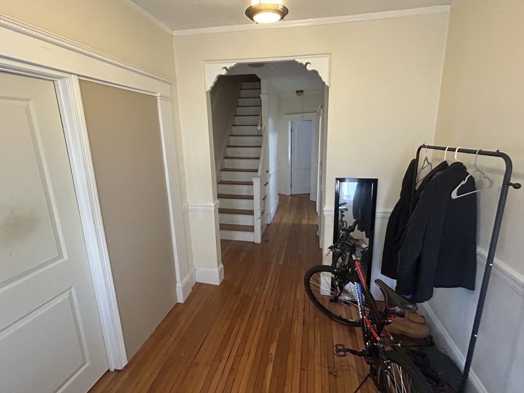 28 Sunset Road, Unit 1 Somerville, MA 02144 - Photo 12 of 15 a view of a hallway with wooden floor