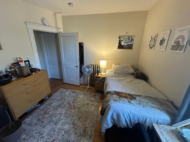 a bed room with a bed and a couch