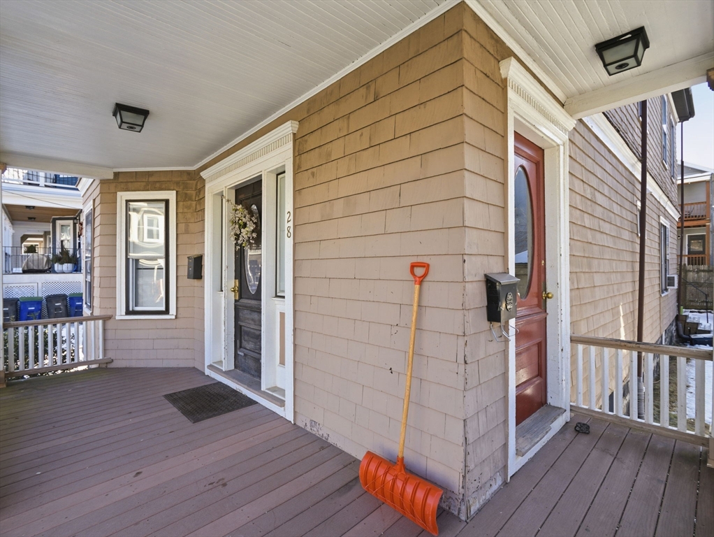 28 Sunset Road, Unit 1 Somerville, MA 02144 - Photo 23 of 33 a view of front door and wooden floor