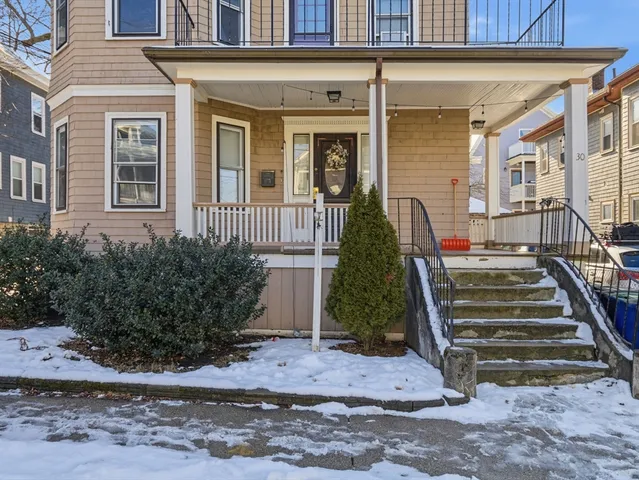 a front view of a building with street view