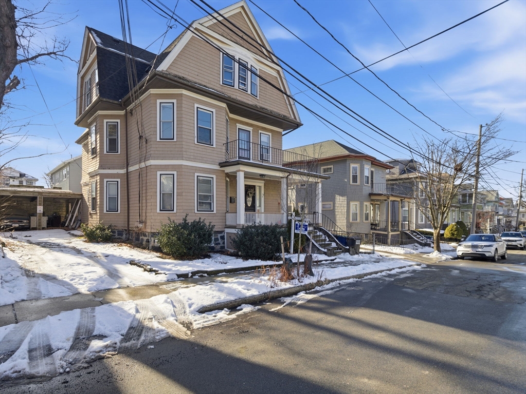 28 Sunset Road, Unit 1 Somerville, MA 02144 - Photo 27 of 33 a front view of a building with street view