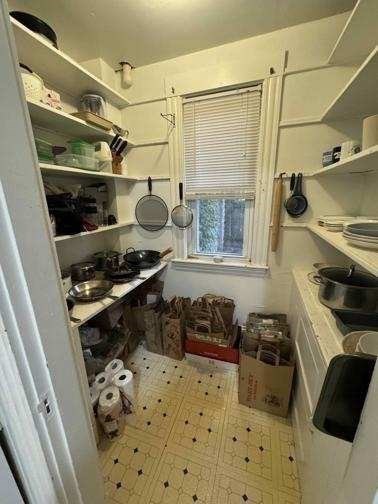 28 Sunset Road, Unit 1 Somerville, MA 02144 - Photo 5 of 15 a kitchen with a stove and a refrigerator