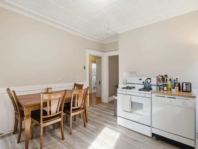a view of a livingroom with furniture and wooden floor