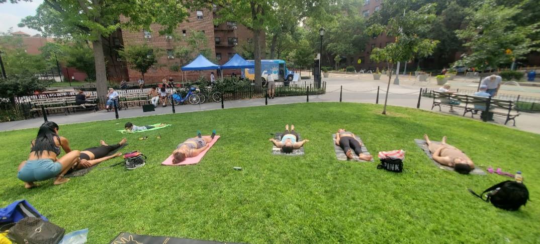 37-30 83rd Street, Unit 2M Queens, NY 11372 - Photo 13 of 20 a group of people sitting in a park