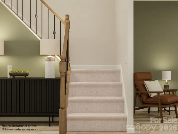 a view of entryway with wooden floor and a potted plant
