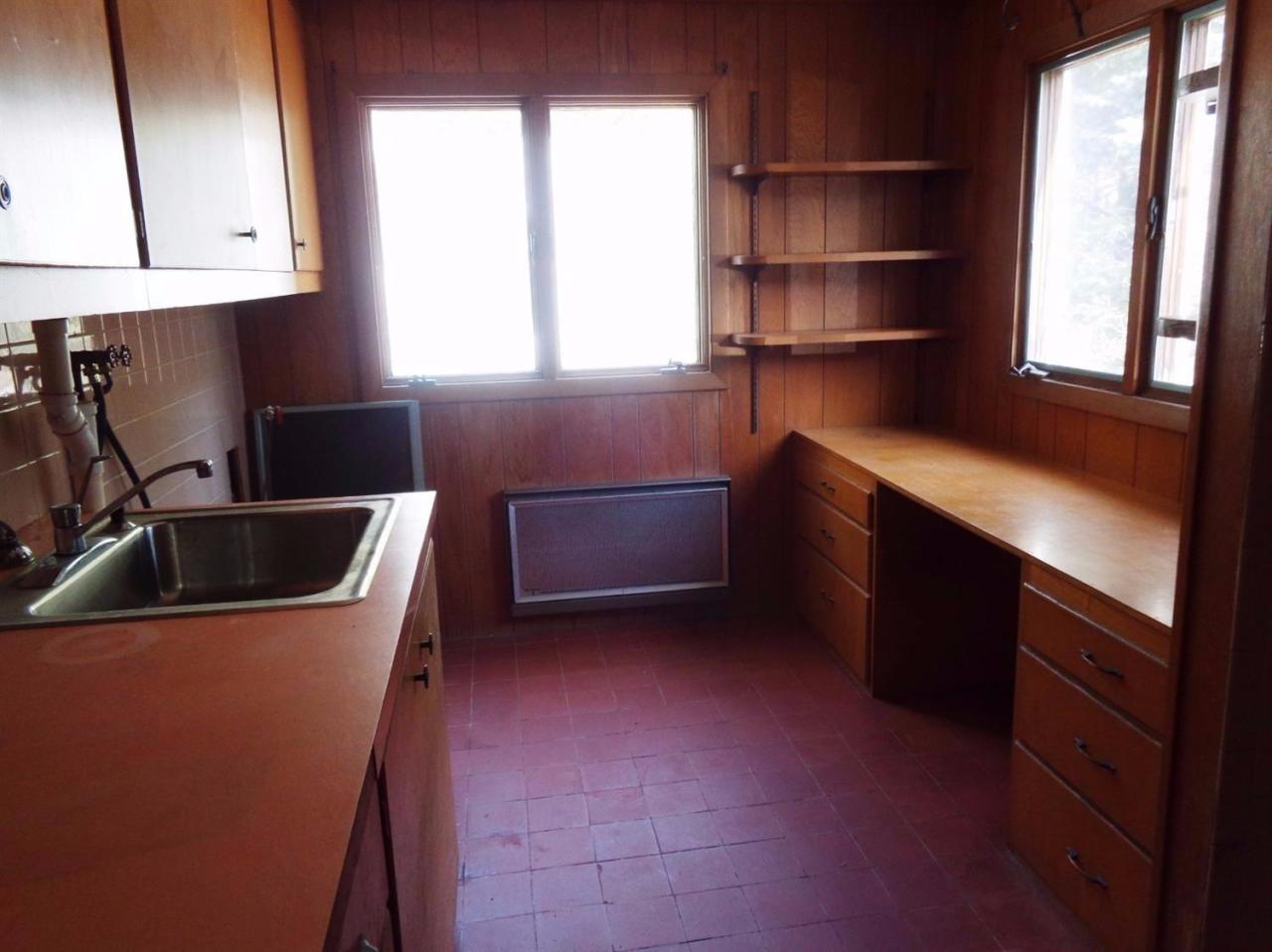 45 Uplands Drive Wellfleet, MA 02667 - Photo 14 of 35 a room with a cabinets and a sink