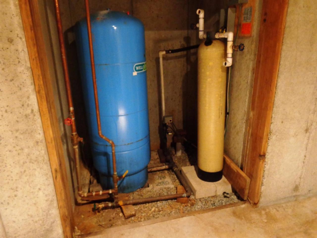 45 Uplands Drive Wellfleet, MA 02667 - Photo 29 of 35 a room with water heater and storage