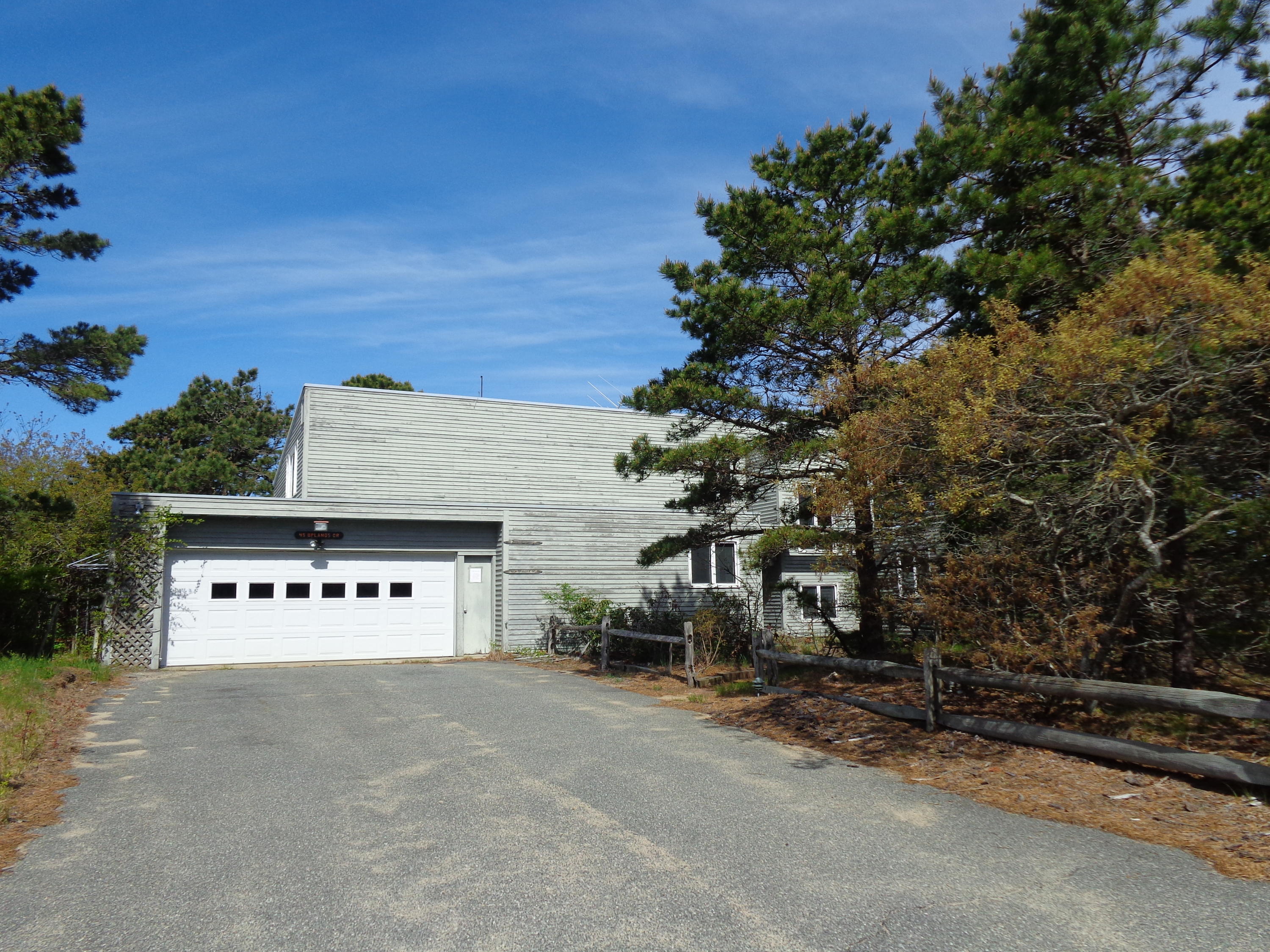 45 Uplands Drive Wellfleet, MA 02667 - Photo 34 of 35 front view of a house with a street