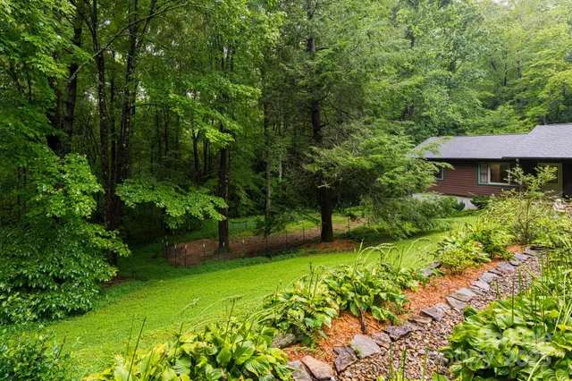 a house with trees in the background
