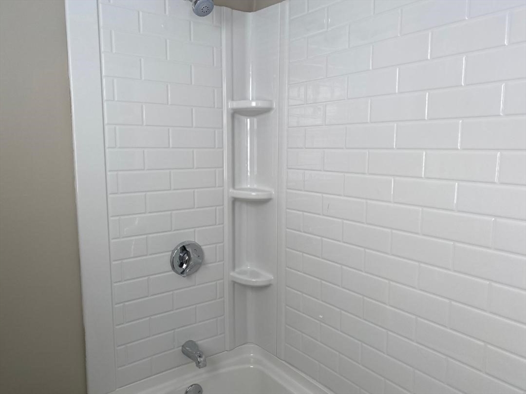 16 Ruggles Street, Unit 1 Westborough, MA 01581 - Photo 20 of 22 a bathroom with a shower