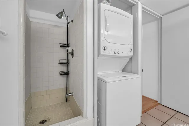 a bathroom with a shower and toilet