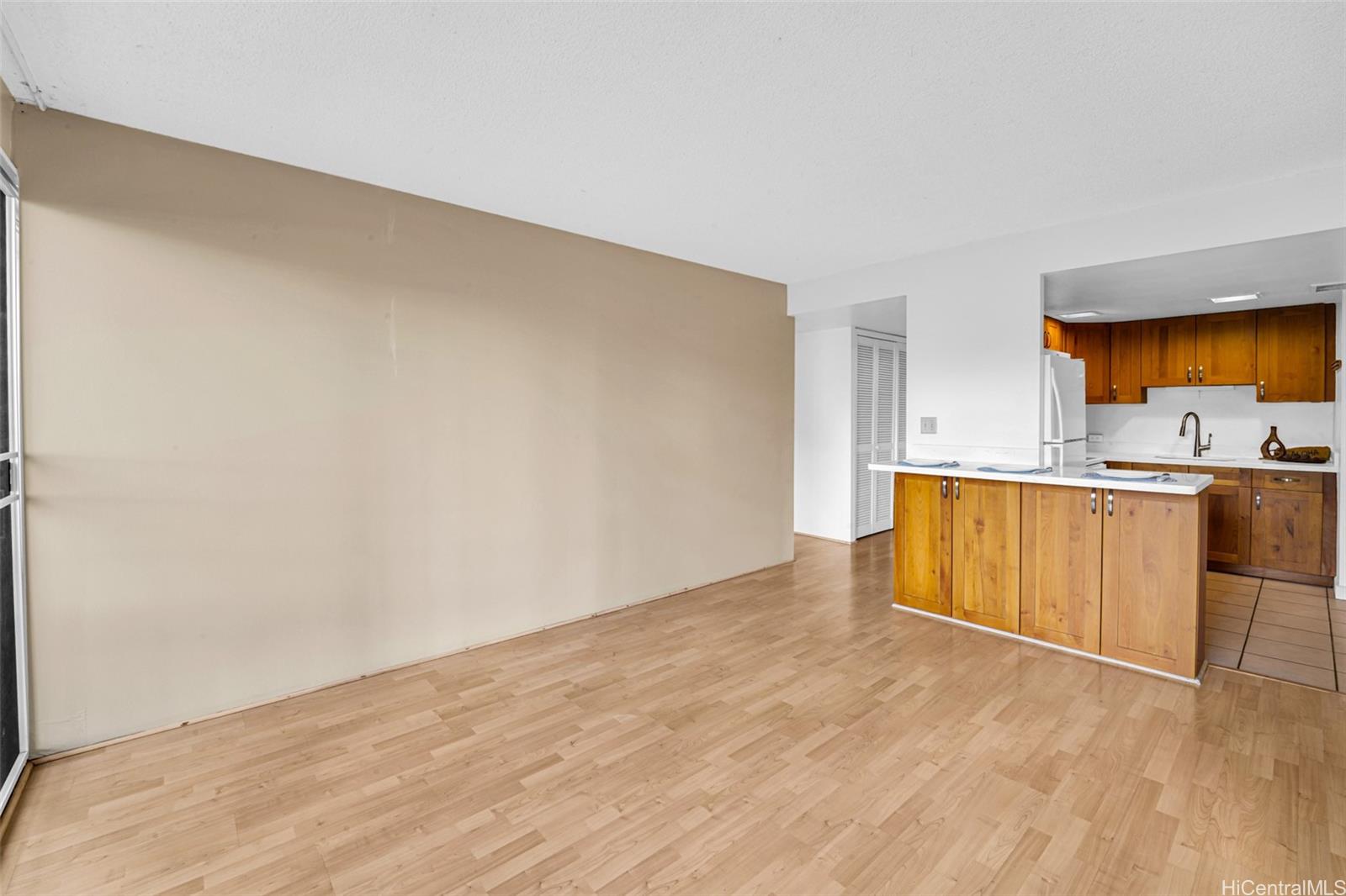 431 Nāhua Street, Unit 309 Honolulu, HI 96815 - Photo 2 of 25 a view of kitchen with wooden floor
