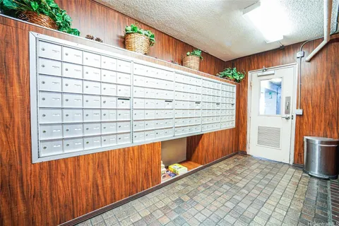 a view of balcony with two chairs and a table