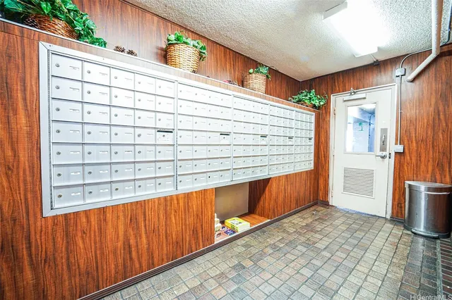 a view of balcony with two chairs and a table