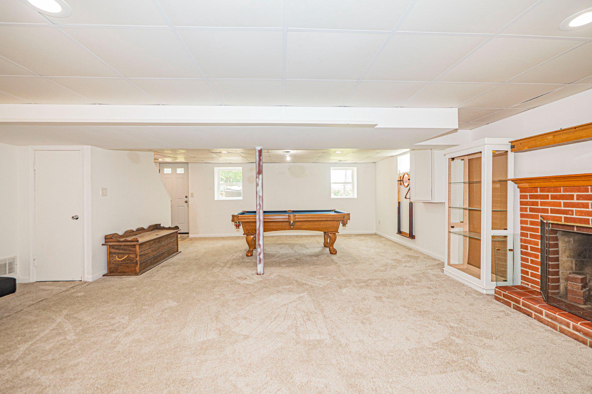 9907 Forge Park Road Perry Hall, MD 21128 - Photo 32 of 36 Spacious basement with cozy charm.