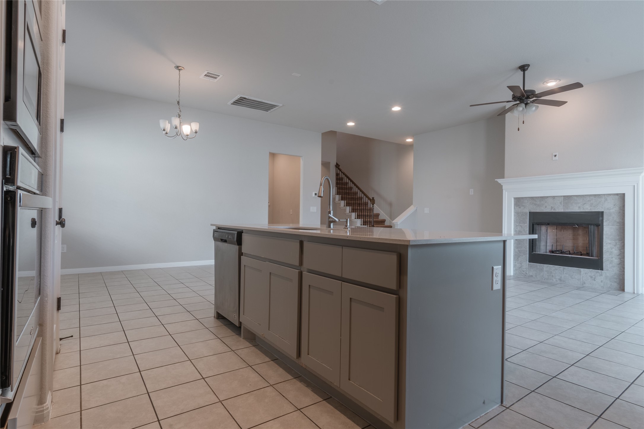 3810 Brushy Creek Road, Unit 77 Cedar Park, TX 78613 - Photo 11 of 33 a view of a kitchen with a sink and a fireplace