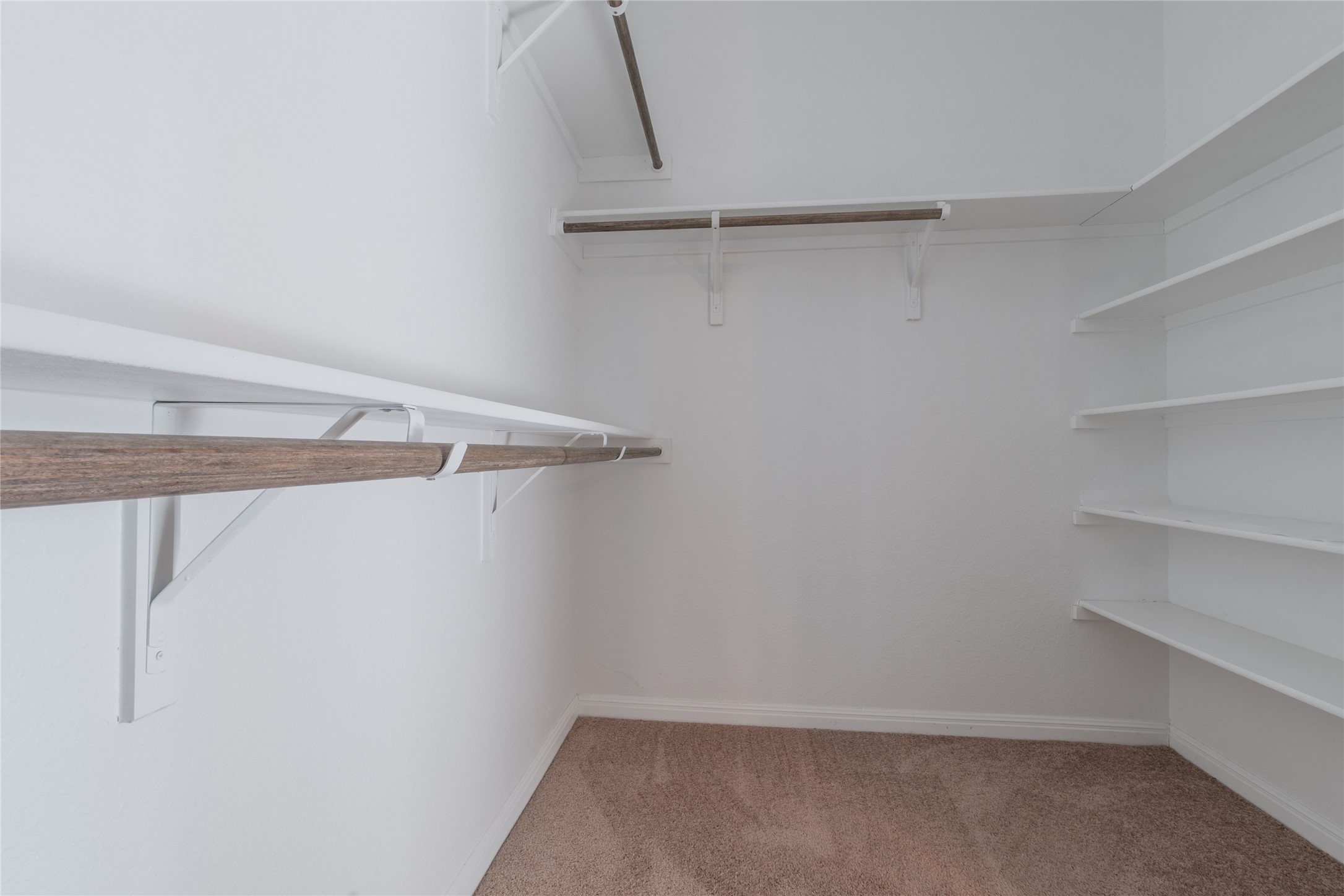 3810 Brushy Creek Road, Unit 77 Cedar Park, TX 78613 - Photo 15 of 33 a view of a room with racks on the wall