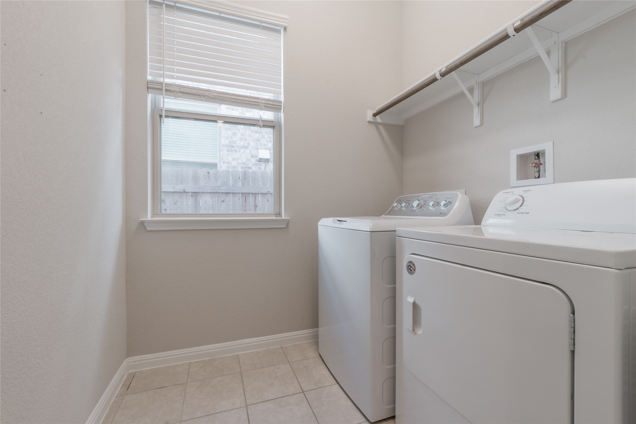 3810 Brushy Creek Road, Unit 77 Cedar Park, TX 78613 - Photo 17 of 33 a utility room with dryer and washer