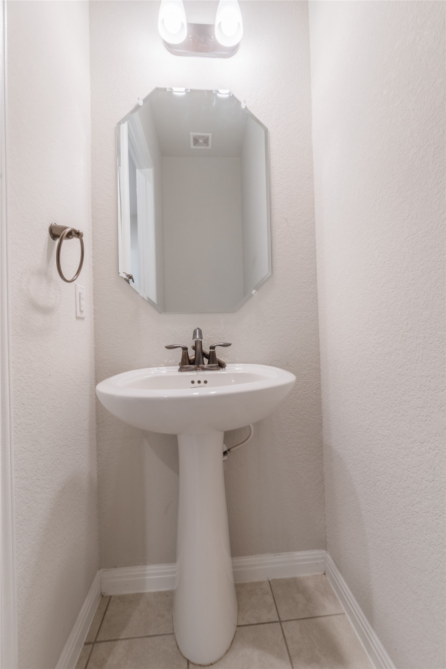 3810 Brushy Creek Road, Unit 77 Cedar Park, TX 78613 - Photo 18 of 33 a bathroom with a sink a mirror and shower