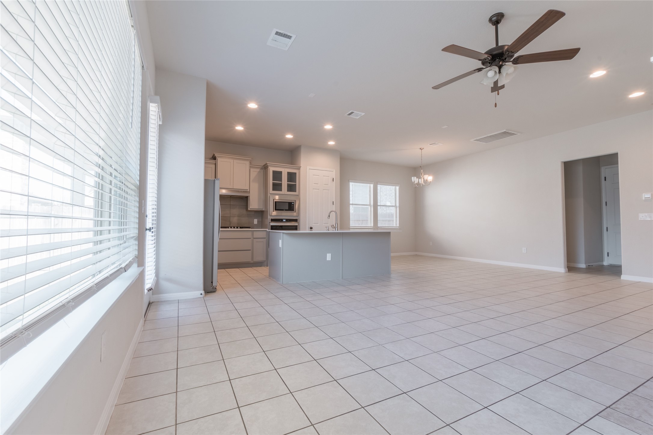 3810 Brushy Creek Road, Unit 77 Cedar Park, TX 78613 - Photo 19 of 33 a view of a kitchen with a sink and an empty room