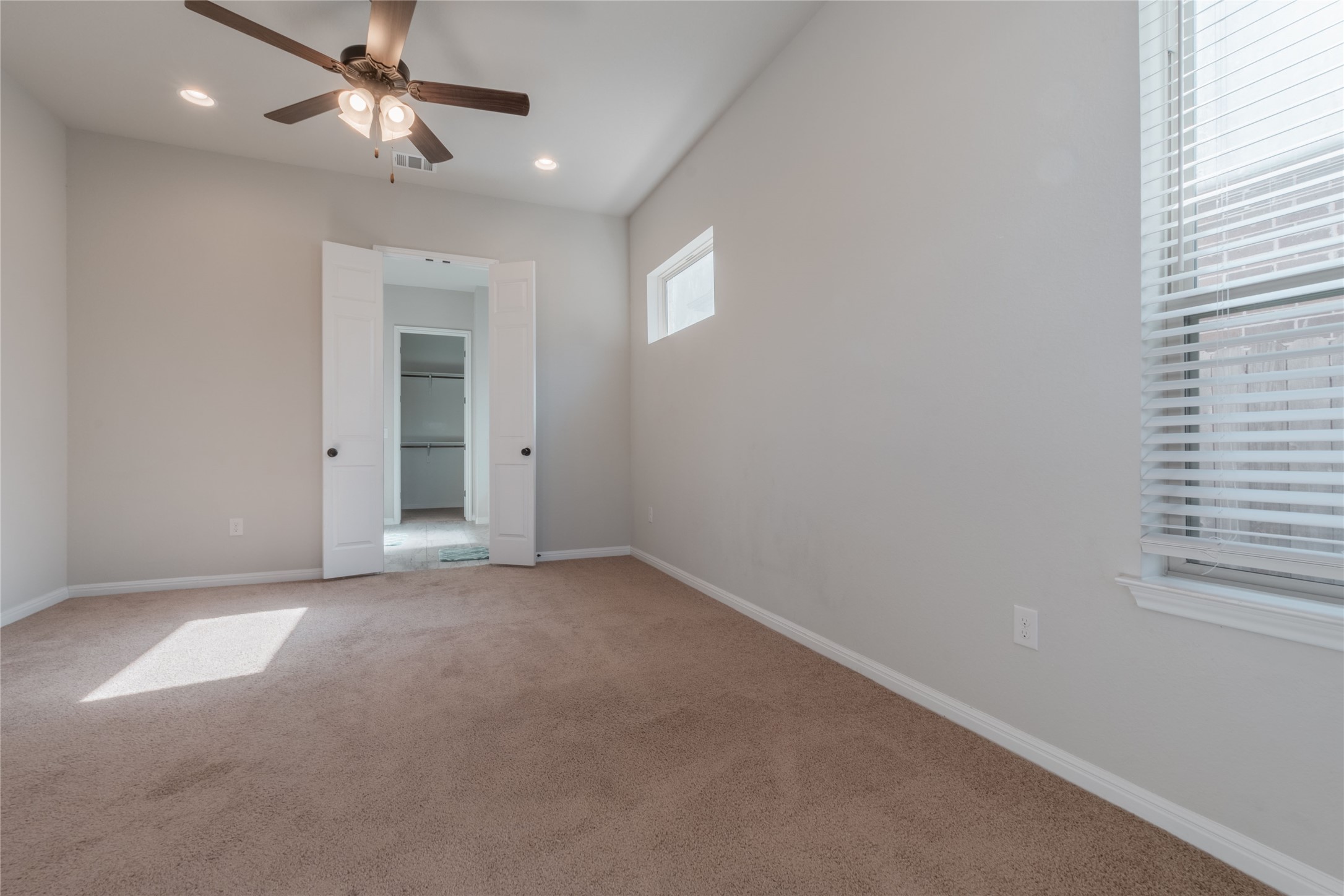 3810 Brushy Creek Road, Unit 77 Cedar Park, TX 78613 - Photo 21 of 33 an empty room with windows and fan